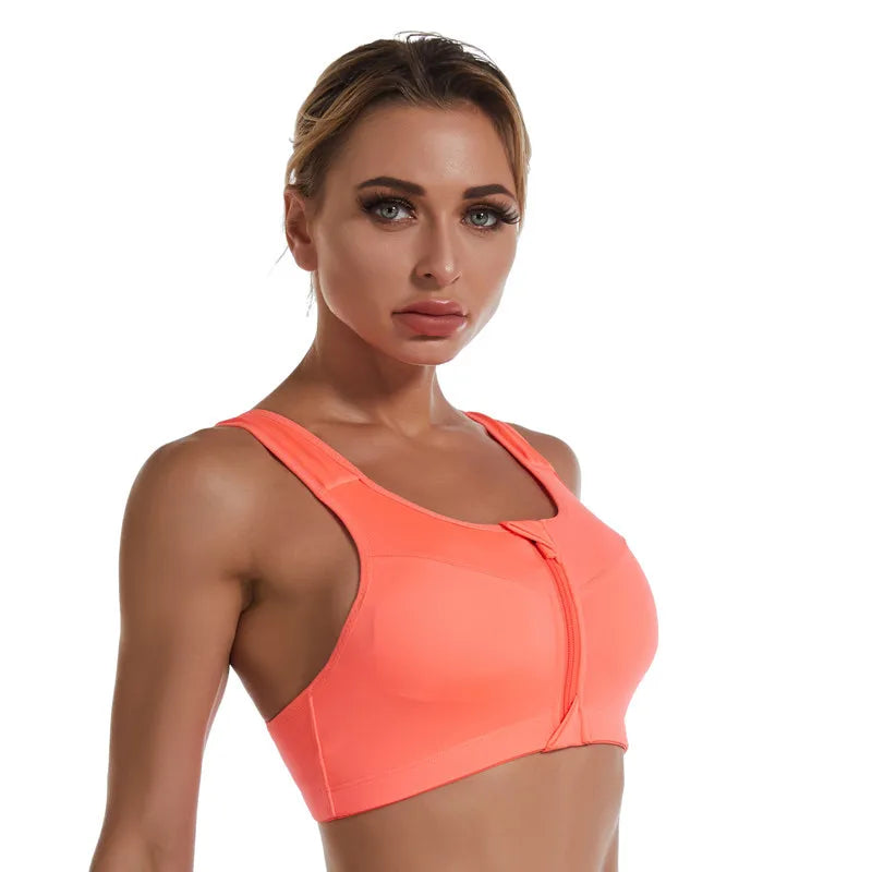 KiKis bright coral zipper sports bra for women with wide straps and front zip closure