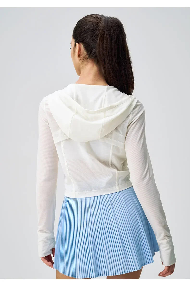 KiKis breathable yoga clothes for women featuring a white mesh hoodie and light blue pleated skirt