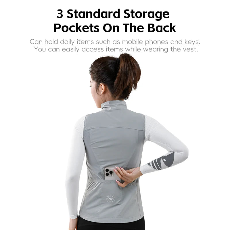 Back view of women's cycling vest summer by KiKis showing three storage pockets holding a phone