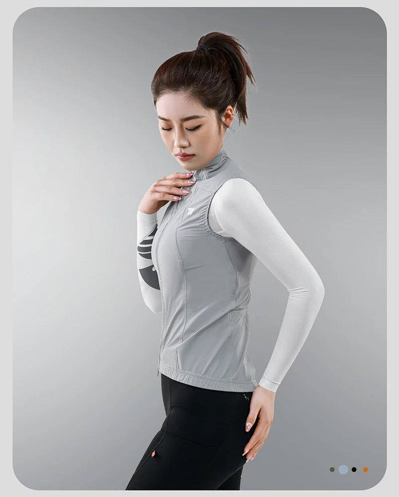 KiKis women's cycling vest summer in light gray worn by model with black leggings and white long sleeve top