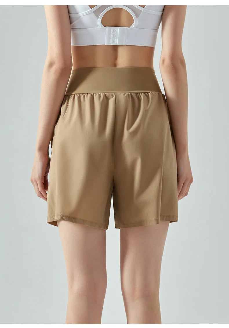 KiKis women's high waist running shorts in brown with elastic waistband and comfortable fit
