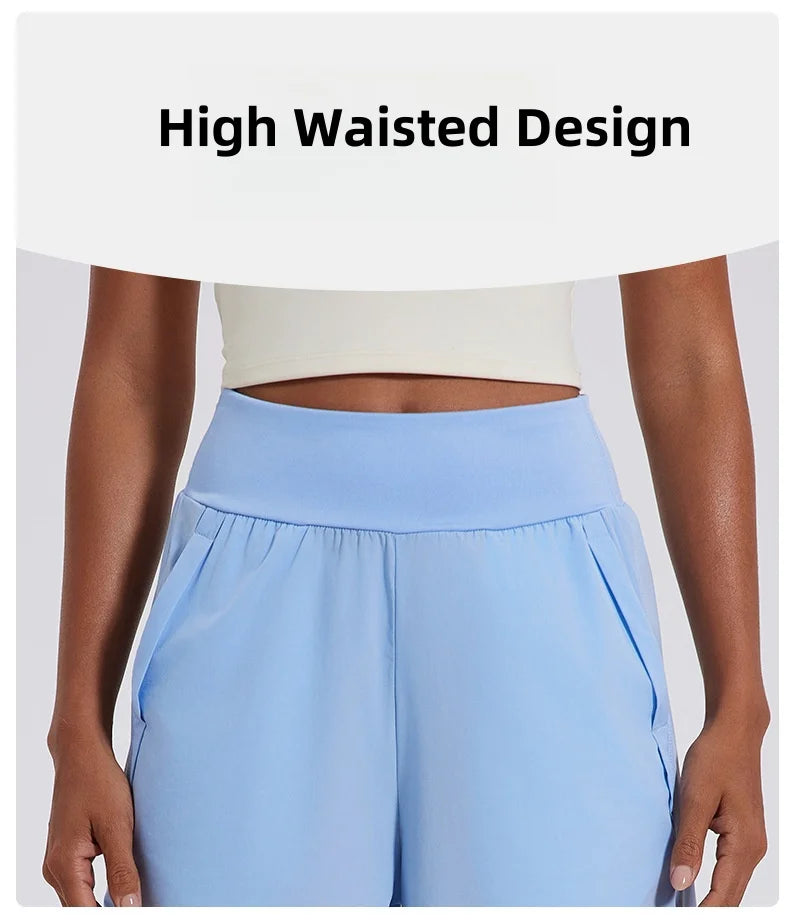 KiKis women's high waist running shorts in light blue with high waisted design and side pockets