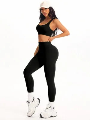 KiKis women's 2 piece yoga set in black featuring a fitted crop top and high-waisted leggings
