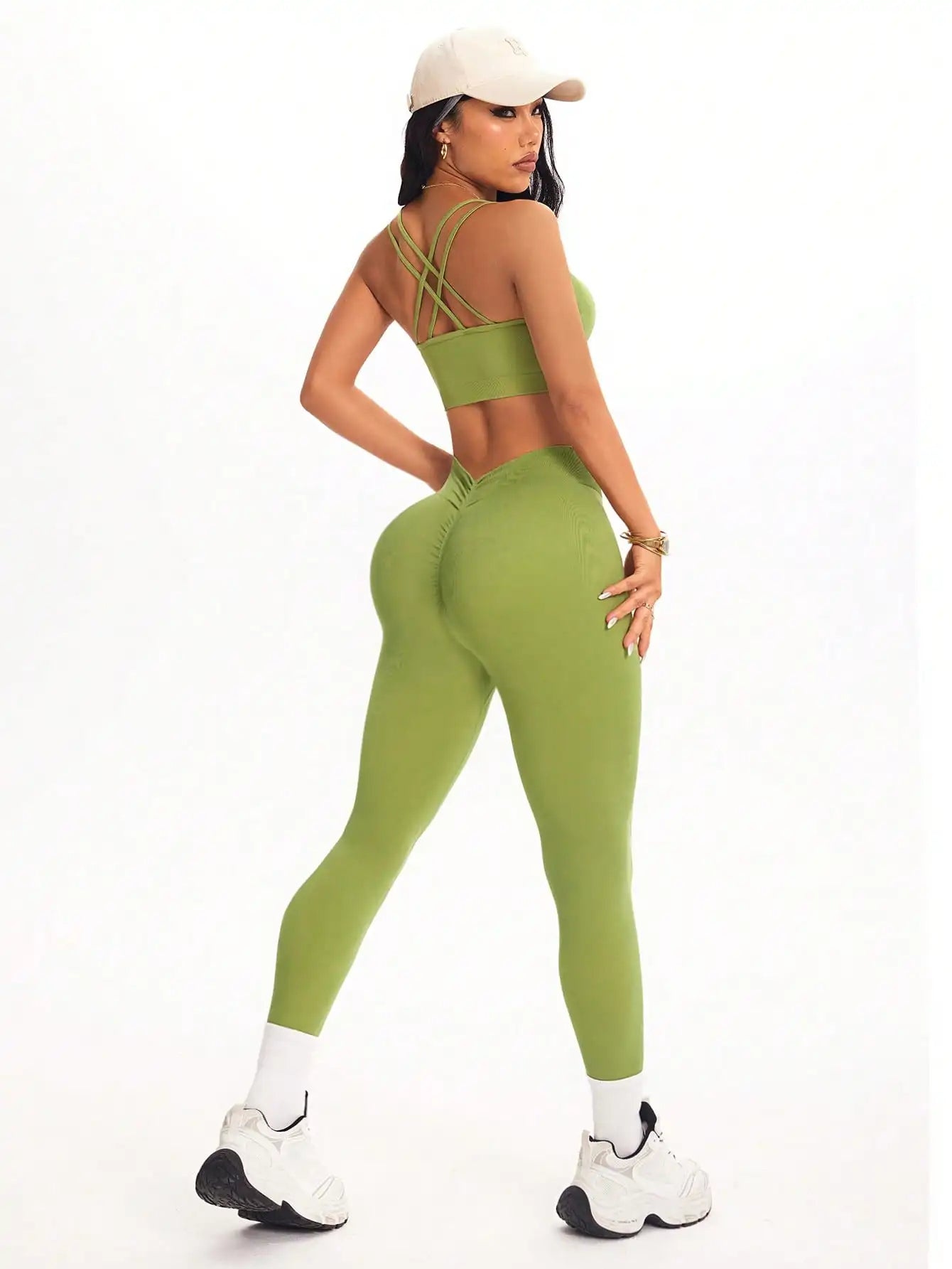 KiKis women's 2 piece yoga set in green with crisscross strap sports bra and high-waisted leggings