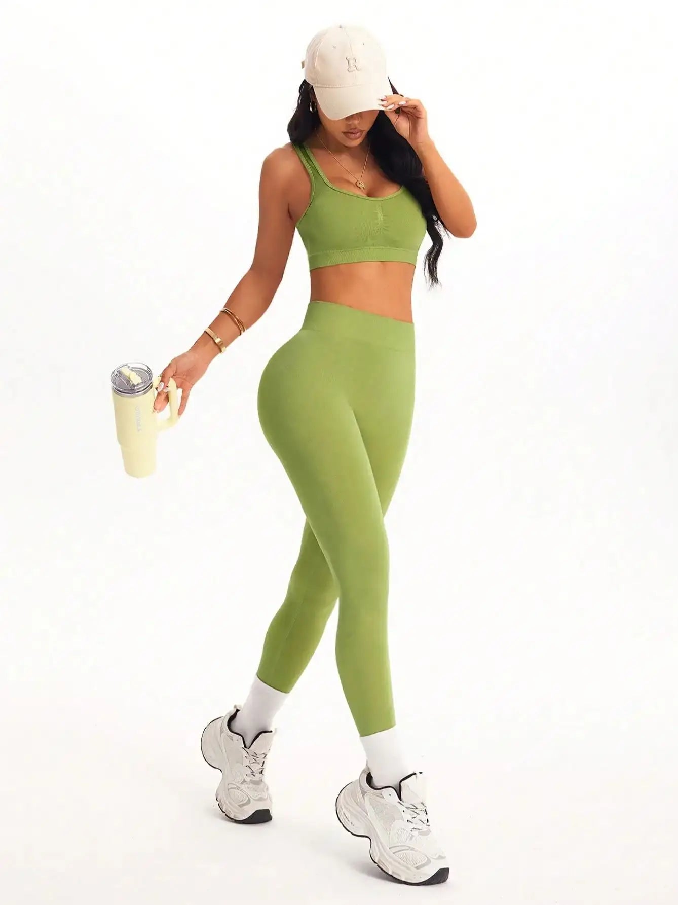 KiKis women's 2 piece yoga set in green with fitted crop top and high-waisted leggings