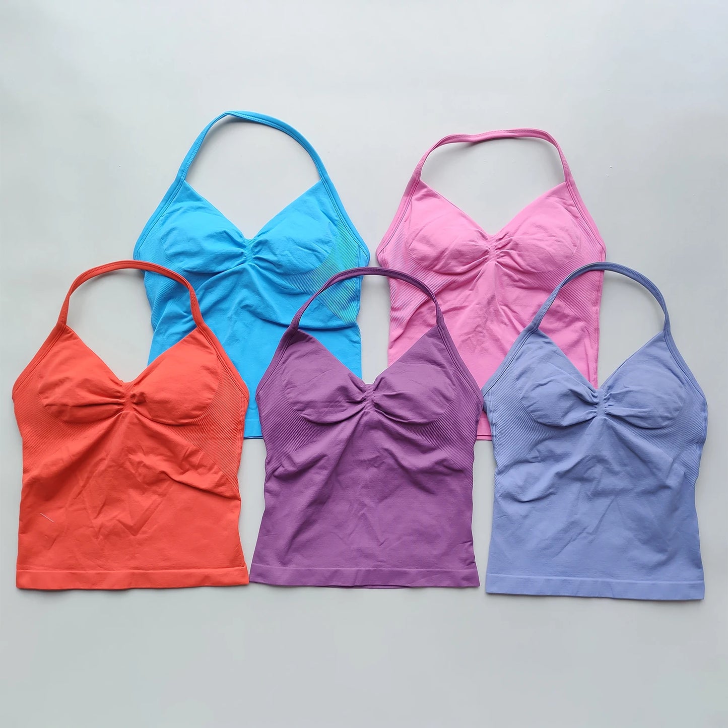 KiKis Women's Backless Gym Top in blue pink orange purple and lavender colors with halter neck design