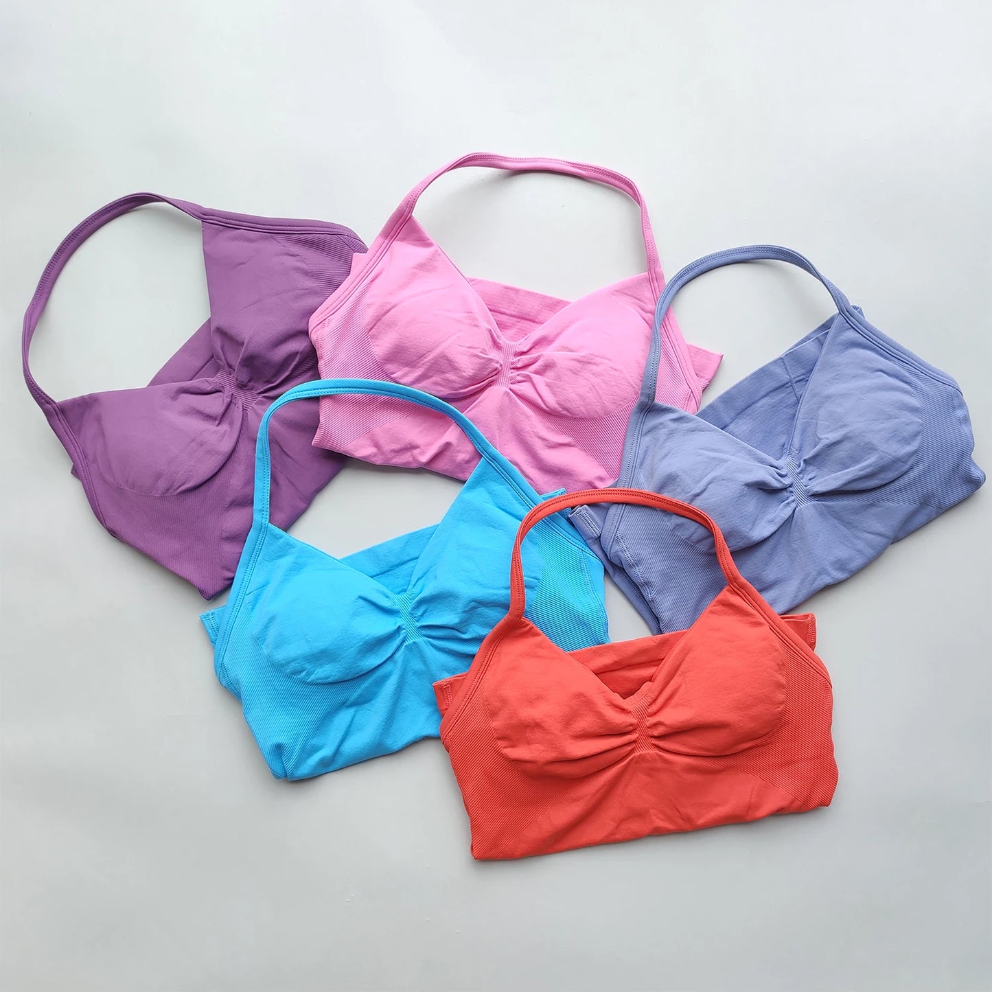 KiKis Women's Backless Gym Top collection in purple pink blue red and lavender colors