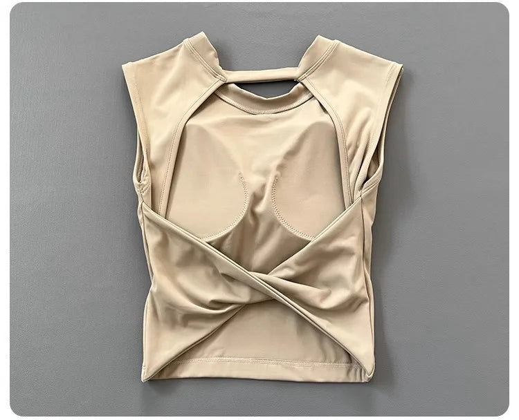 KiKis beige women's backless sports tank top with padded support and stylish open back design