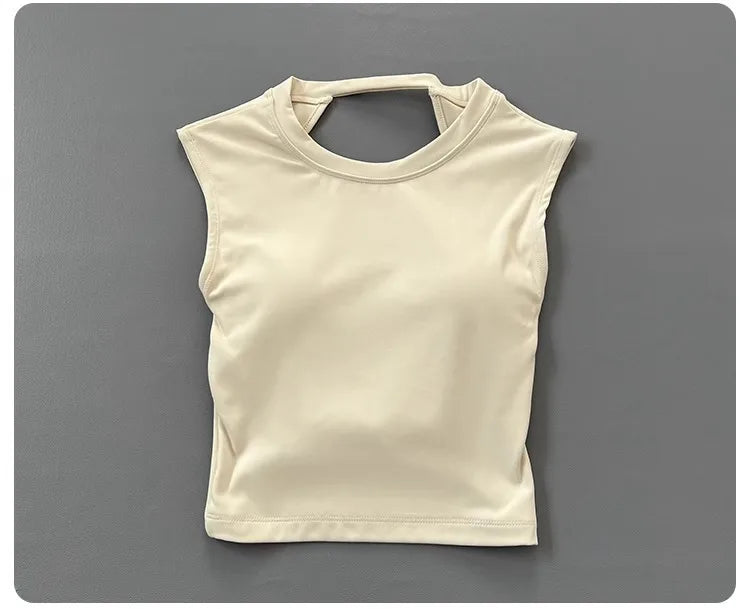 KiKis women's backless sports tank top in beige with sleeveless design and keyhole back cutout