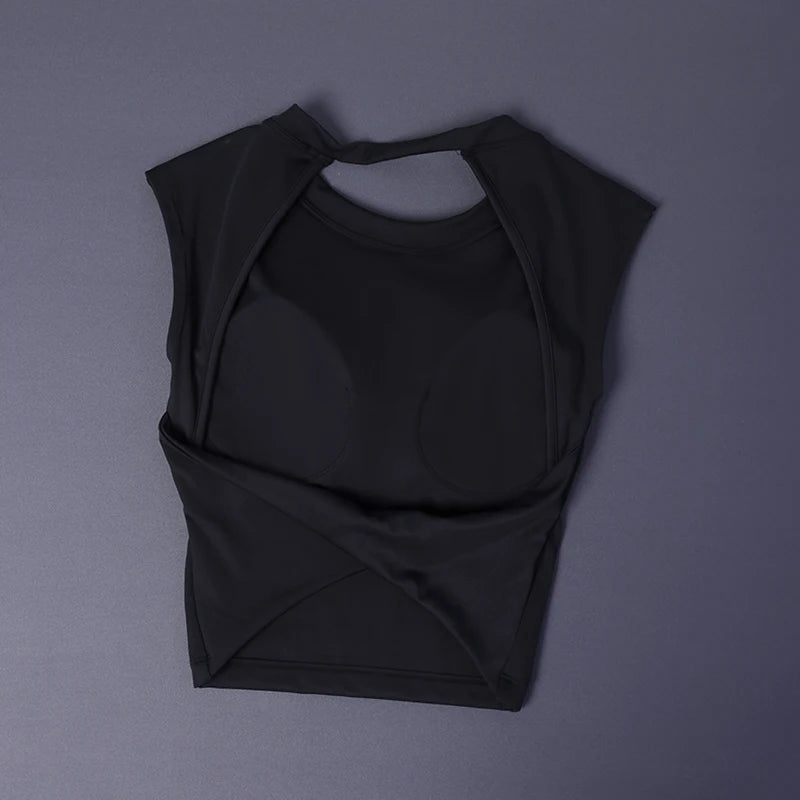 KiKis black women's backless sports tank top laid flat showing front and back design