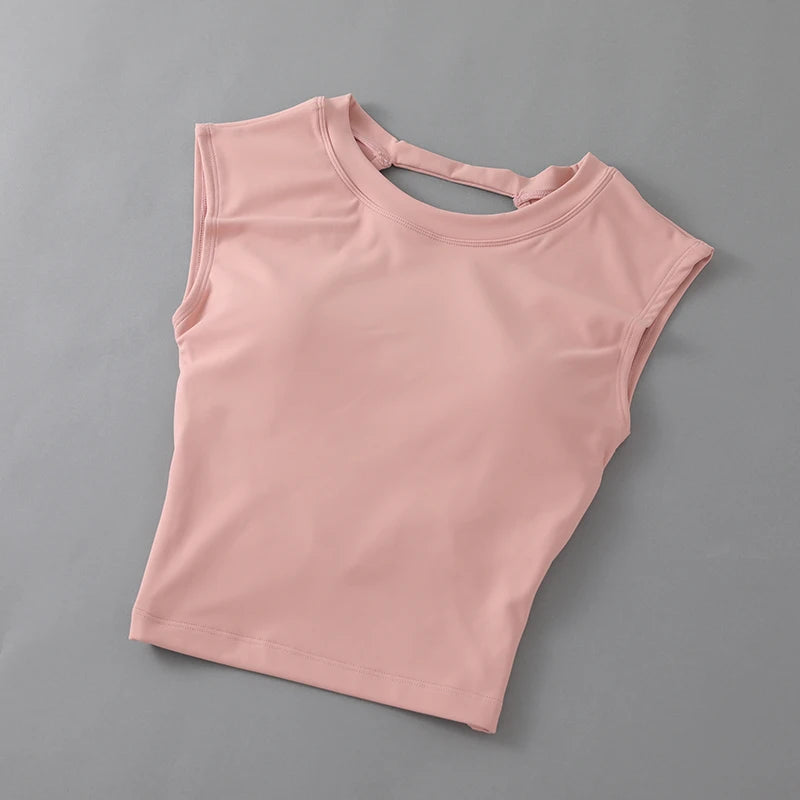 KiKis women's backless sports tank top in soft pink with sleeveless design and back strap detail