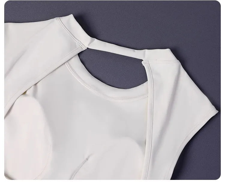 KiKis women's backless sports tank top in white with seamless design on gray background