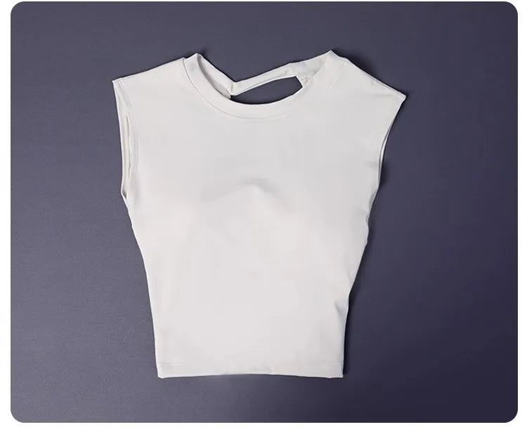 KiKis white women's backless sports tank top with sleeveless design and cutout detail