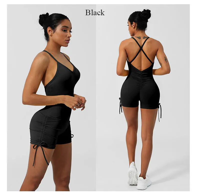 KiKis women's cross back yoga jumpsuit in black with adjustable side ties and fitted design