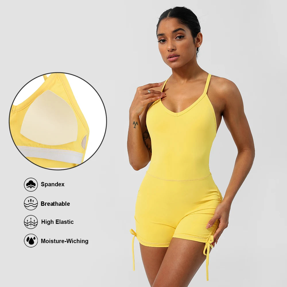 Yellow women's cross back yoga jumpsuit by KiKis with breathable, high elastic, and moisture-wicking fabric