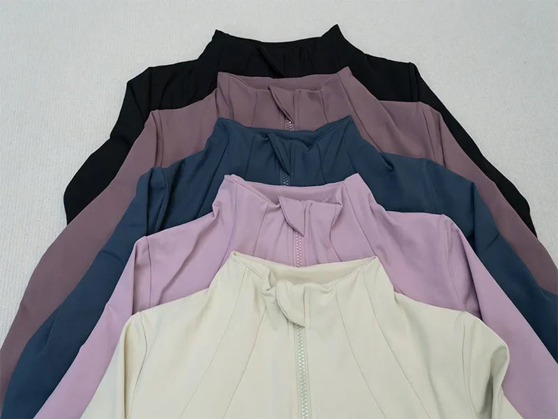KiKis women's fleece yoga jacket in multiple colors including black, mauve, blue, lavender, and cream
