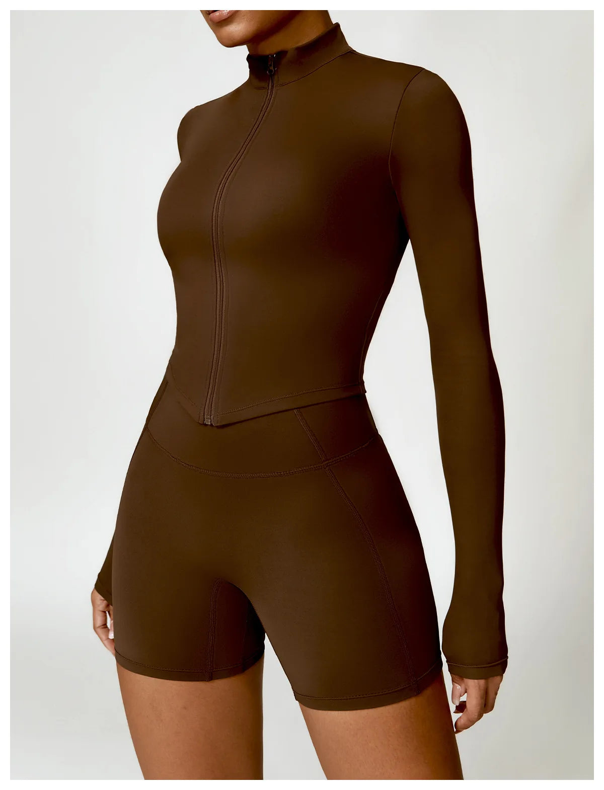 KiKis women's gym workout zip up top in brown with long sleeves and fitted design