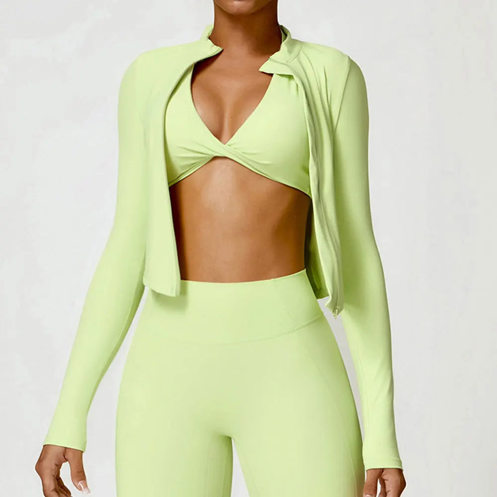 KiKis women's gym workout zip up top in light green worn with matching high-waisted leggings