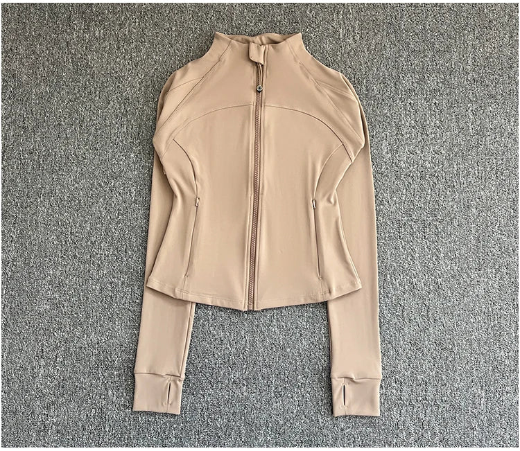 KiKis women's high-end exercise jacket in beige with full front zipper and thumbhole cuffs