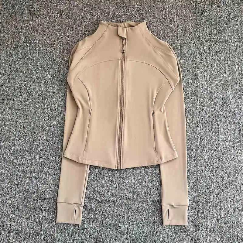 Beige women's high-end exercise jacket with front zipper and thumb holes from KiKis