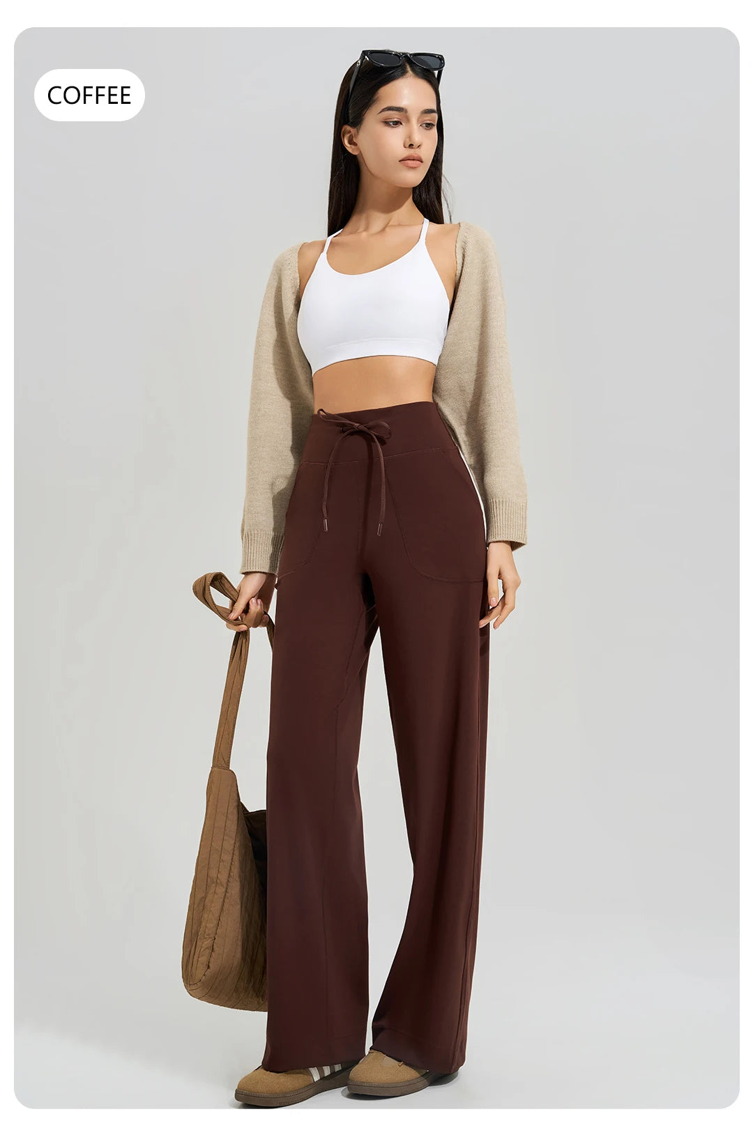 KiKis Women's High Waist Loose Running Yoga Pants in coffee color worn with white crop top and beige cardigan