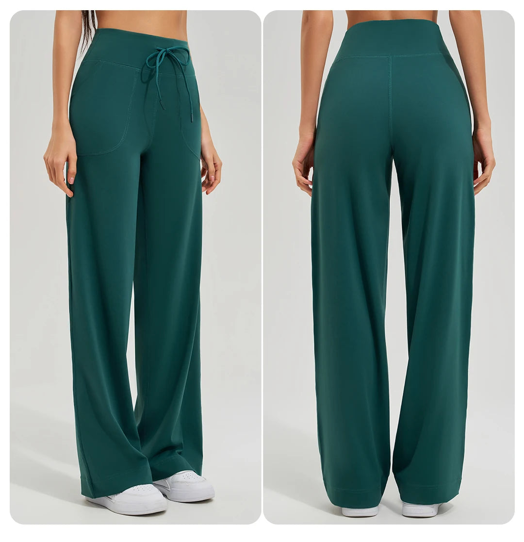 KiKis women's high waist loose running yoga pants in dark green with drawstring waist