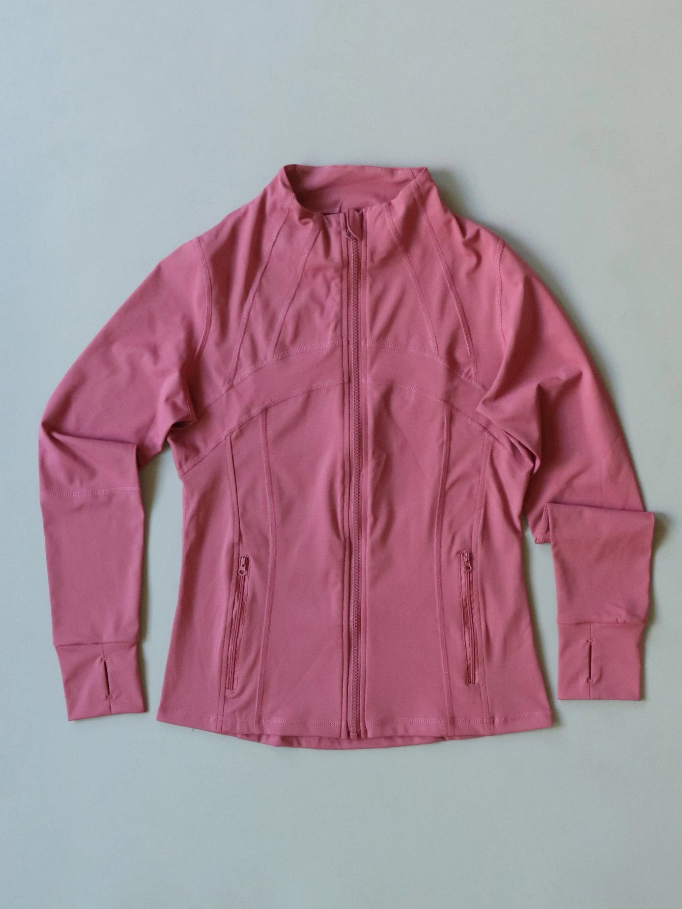 KiKis Women's Lightweight ZipUp Activewear Jacket in pink with full front zipper and thumb holes