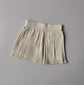 KiKis Women's Organ Pleated Tennis Skirt in light beige with elastic waistband