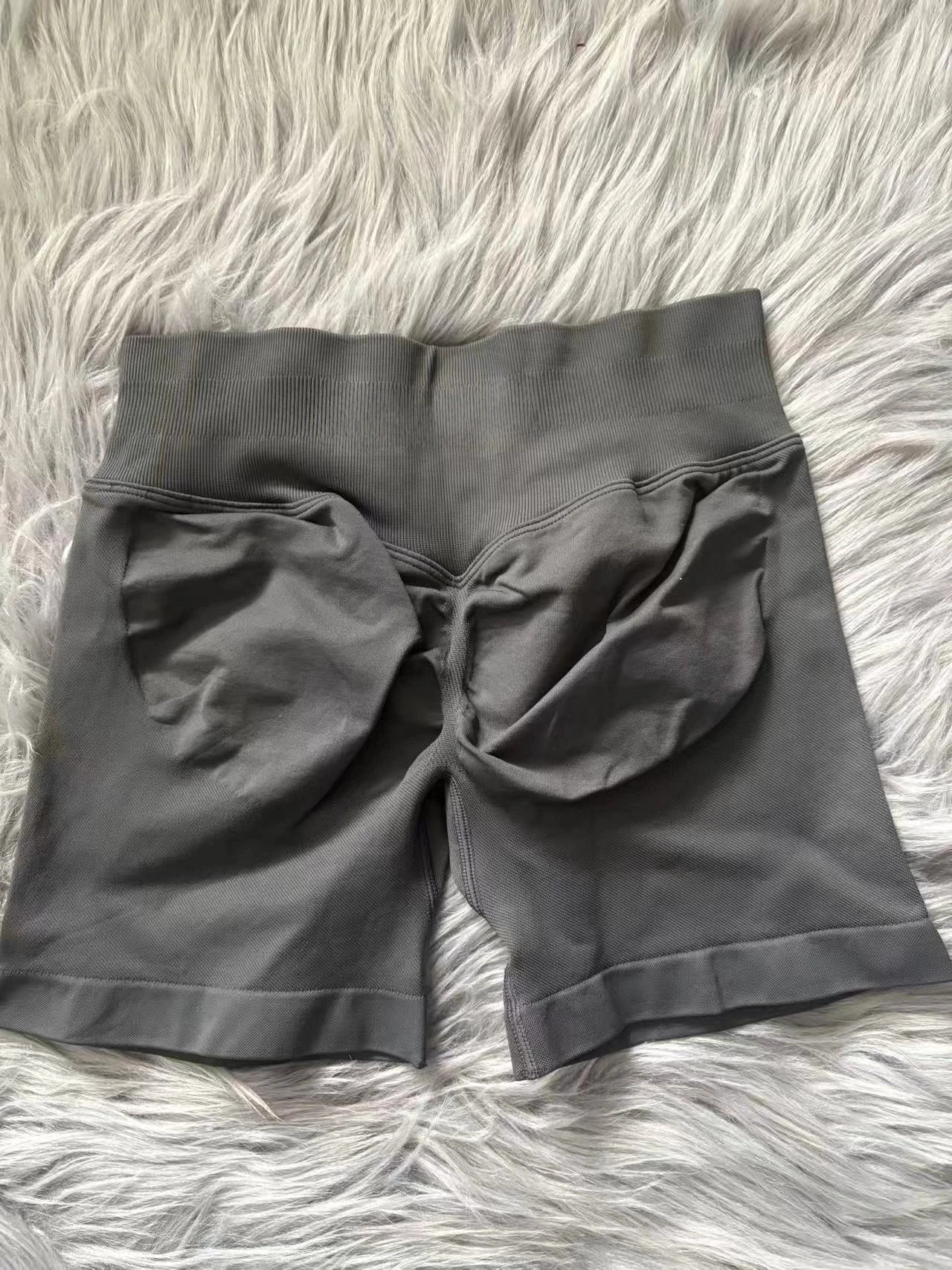 KiKis women's peach hip yoga shorts in gray showing high waistband and scrunched back design