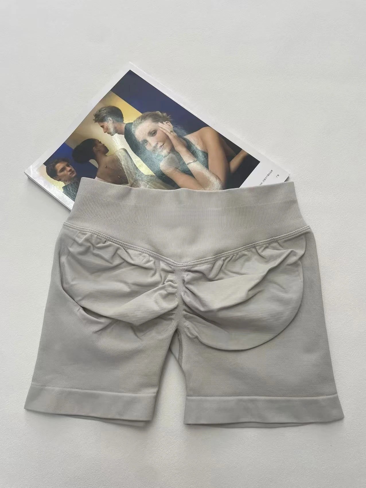 KiKis women's peach hip yoga shorts with ruched back detail and comfortable waistband