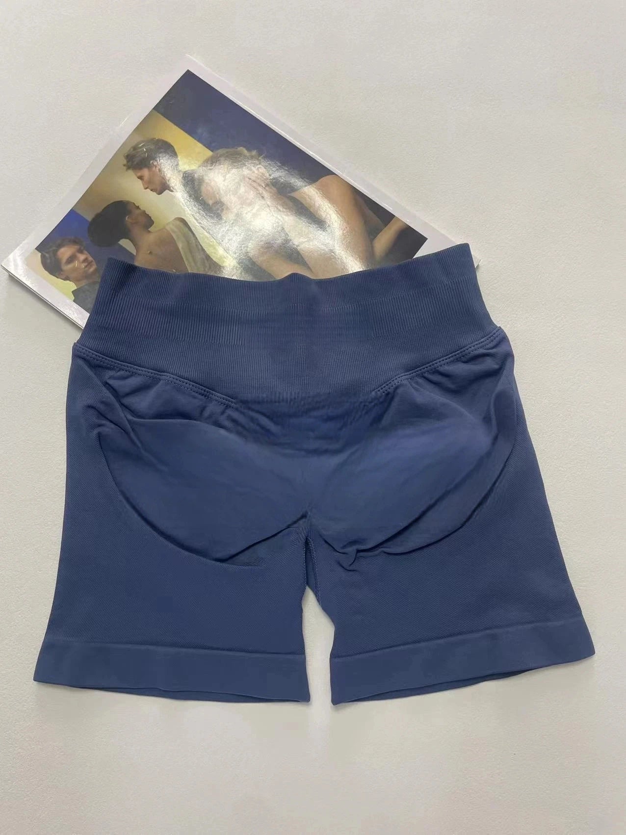 KiKis women's peach hip yoga shorts in navy blue with high waist and comfortable fit