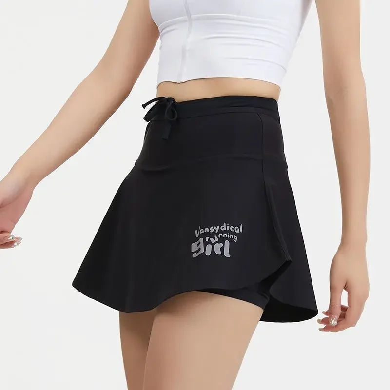 KiKis black women's quick dry tennis skirt with built-in shorts and drawstring waist