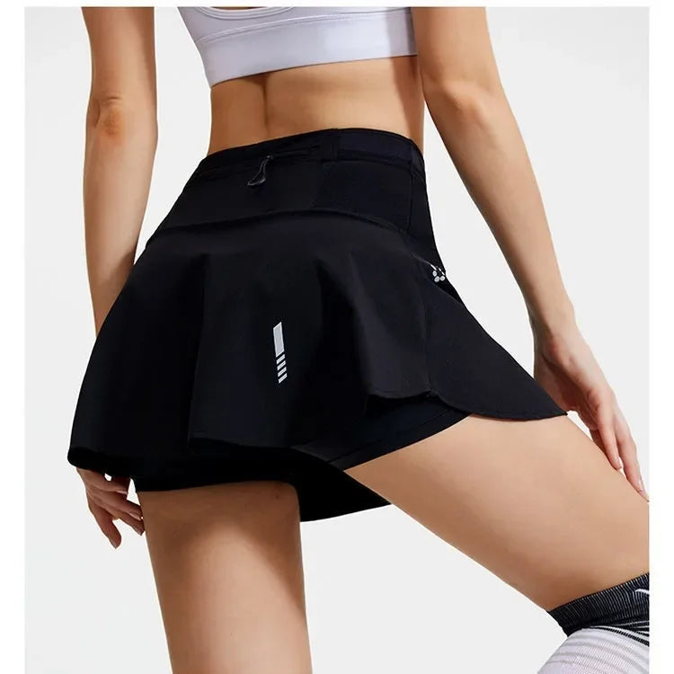 KiKis women's quick dry tennis skirt in black with built-in shorts and comfortable waistband