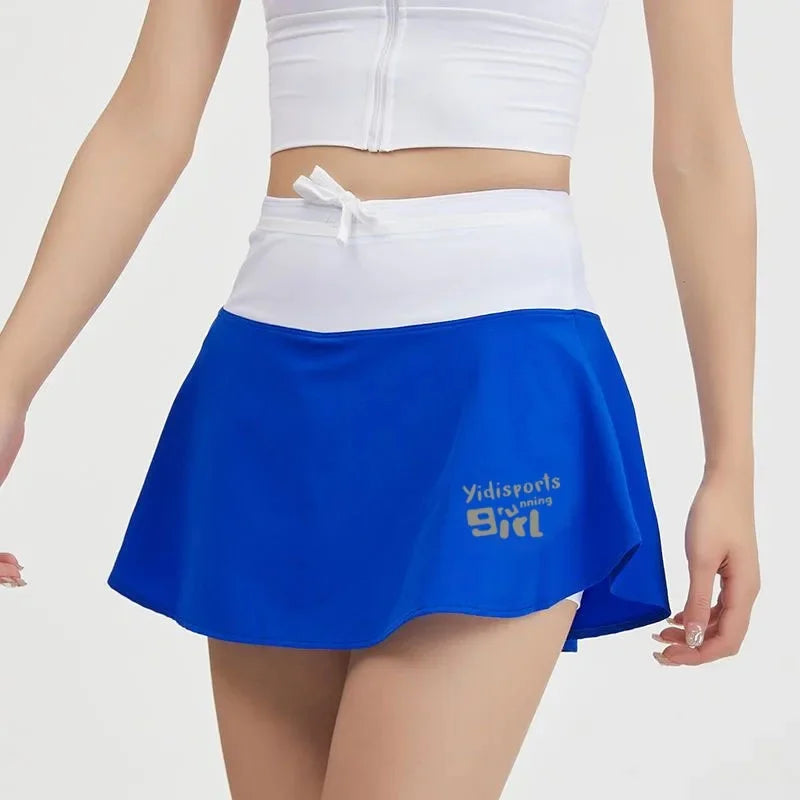 KiKis women's quick dry tennis skirt in blue with white waistband and drawstring