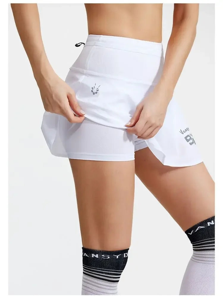 KiKis women's quick dry tennis skirt in white with built-in shorts and comfortable fit