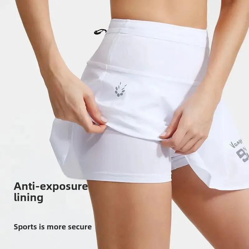 KiKis women's quick dry tennis skirt in white with anti-exposure lining for secure sports