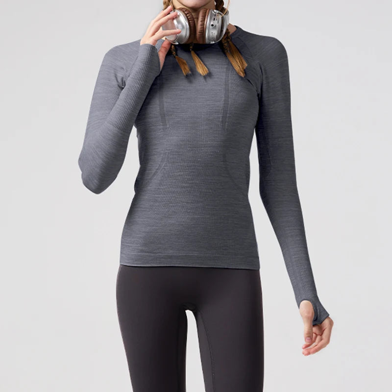 KiKis women's quick dry workout shirt in gray with long sleeves and thumb holes