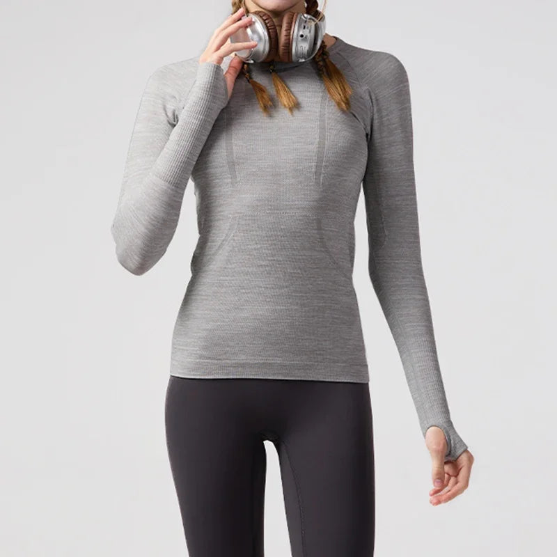KiKis women's quick dry workout shirt in gray with long sleeves and thumb holes
