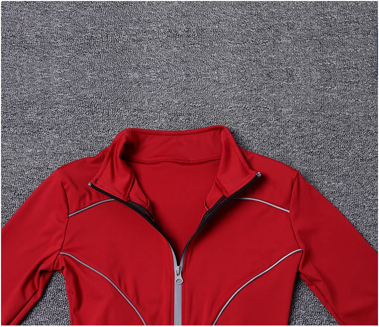 KiKis red women's reflective yoga jacket with front zipper and reflective trim details