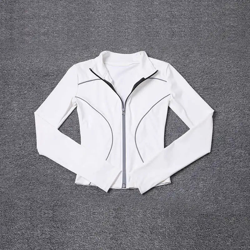 White women's reflective yoga jacket with full zip and sleek curved seam design by KiKis