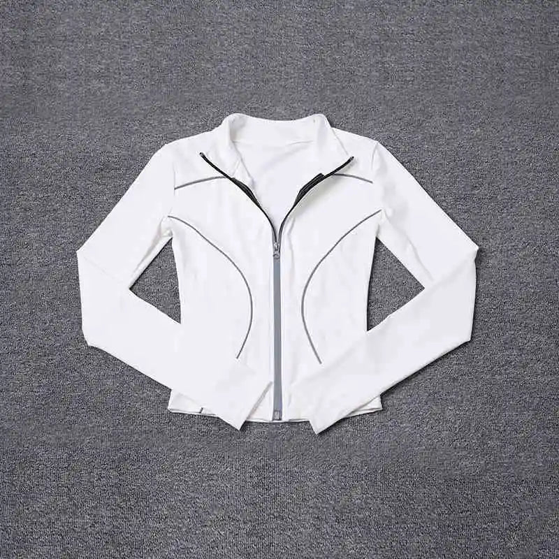 KiKis white women's reflective yoga jacket with full front zipper and sleek curved seam detailing