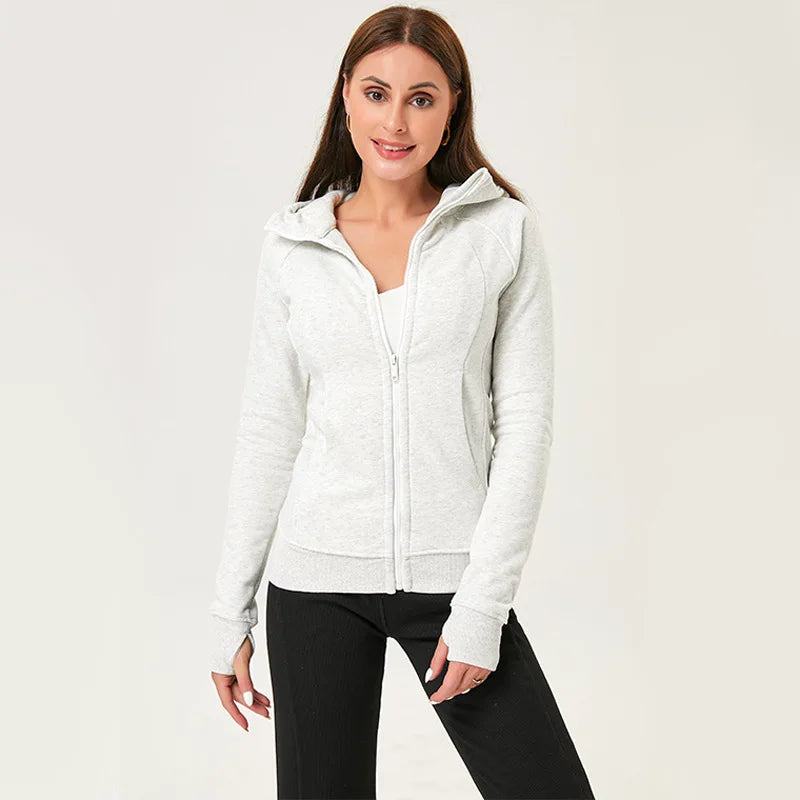 KiKis women's running zip up hoodie in light gray with front pockets and thumb holes