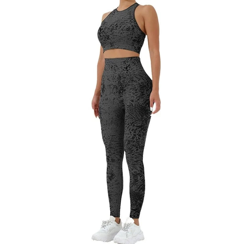 KiKis black textured women's seamless yoga set with high-waisted leggings and crop top