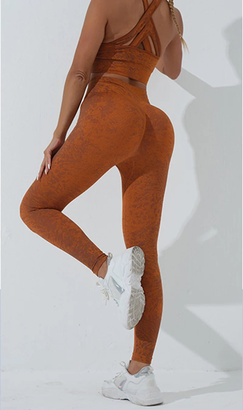 KiKis women's seamless yoga set in rust color with high-waisted leggings and strappy sports bra