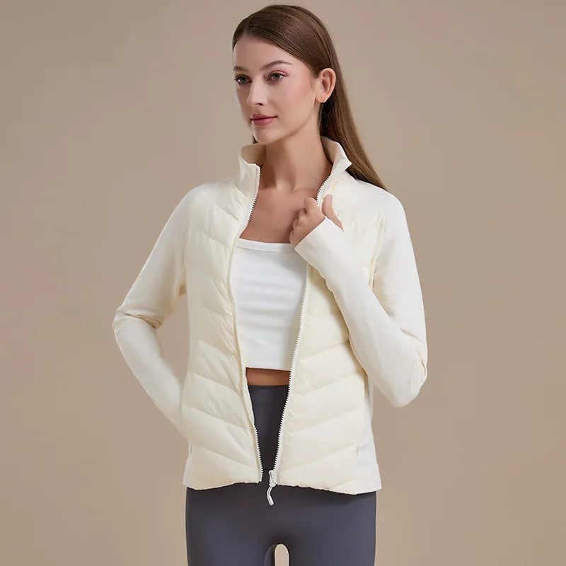 KiKis women's short down jacket in white with full zipper and high collar for lightweight warmth