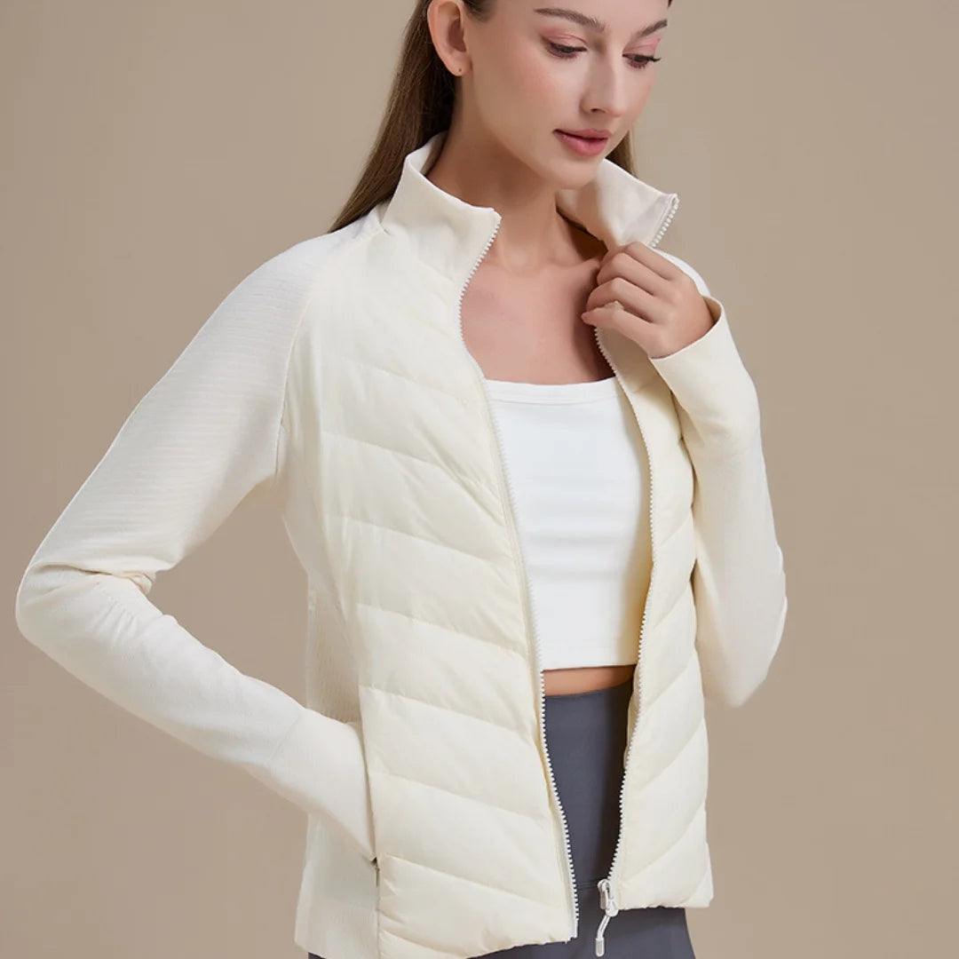 KiKis women's short down jacket in white with full zip and quilted front design