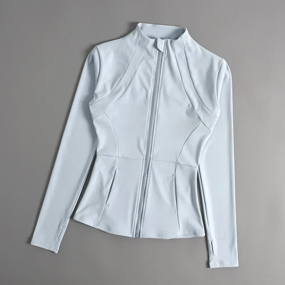 Light blue women's slim fit sports coat with front zipper and high collar laid flat