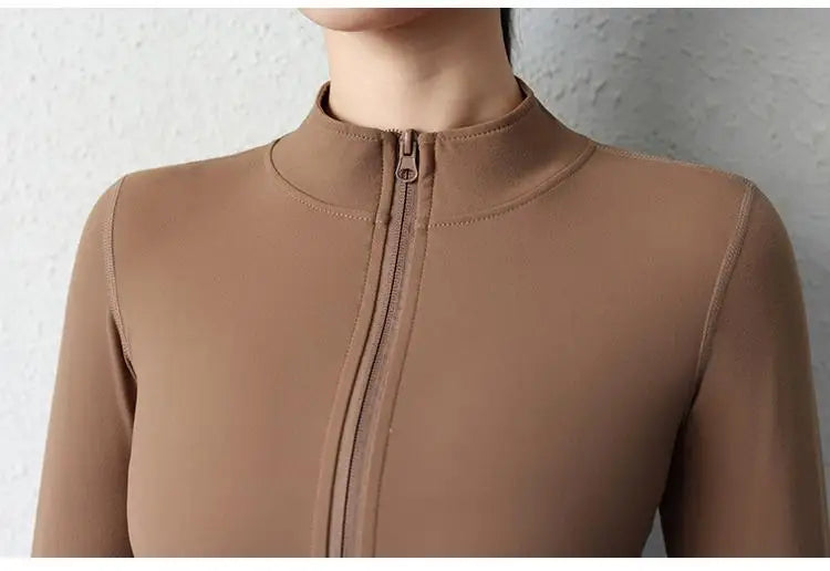 KiKis women's slim fit yoga jacket in brown with front zipper and high collar design