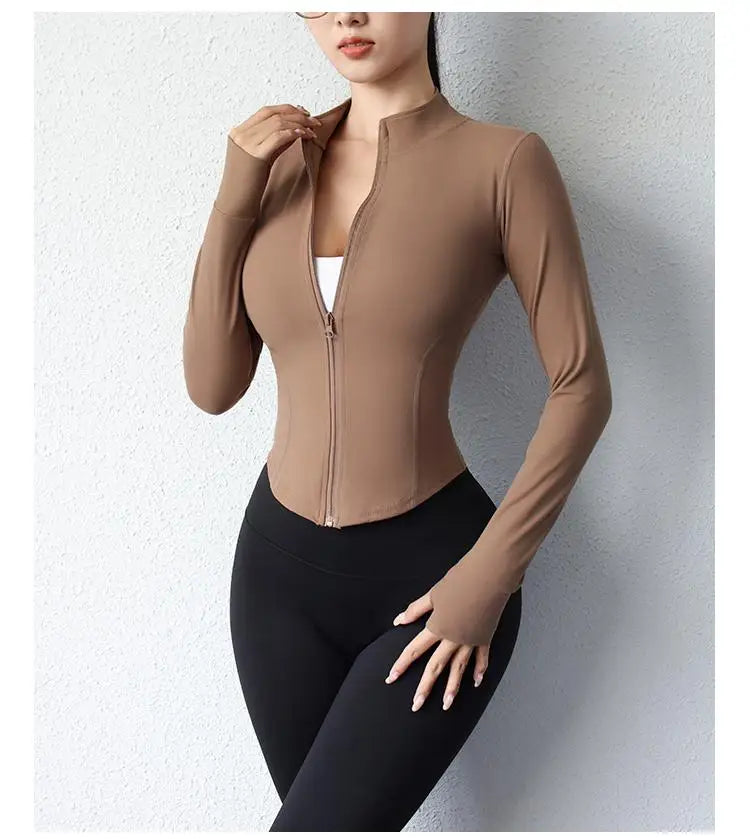 KiKis women's slim fit yoga jacket in brown with full front zipper and thumb holes