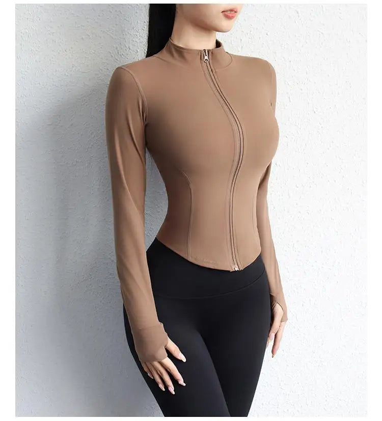 Kikis women's slim fit yoga jacket in brown with long sleeves and front zipper closure